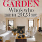 cove of house and Garden magazine featuring jewelry from the wandering jewelring a white modern Scandinavian living room andatu