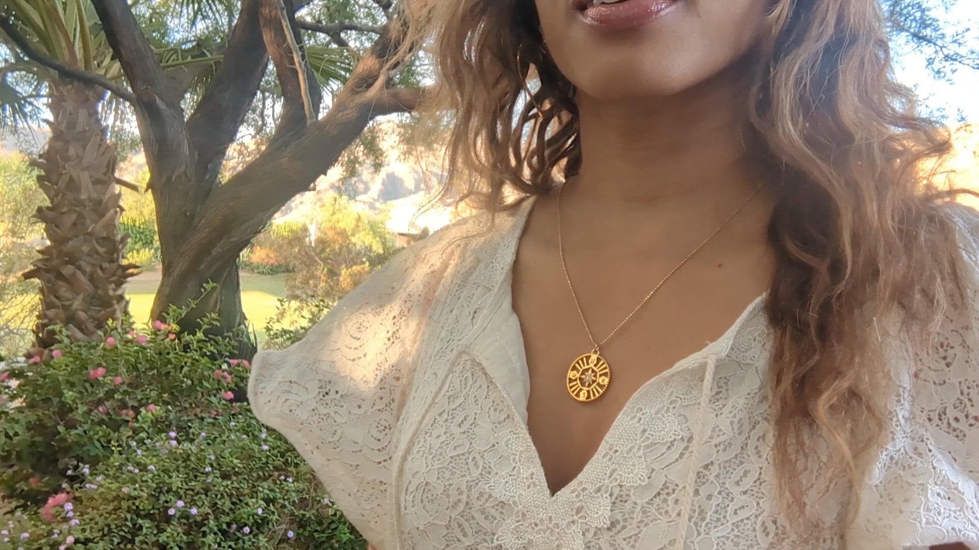 black woman in white dress in forrest wearing the 7 diamond pendant necklace from the wandering jewel