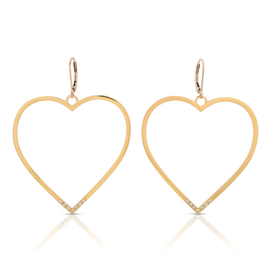 large gold hoop earrings in the shape of a heart  in Gold from the wandering jewel