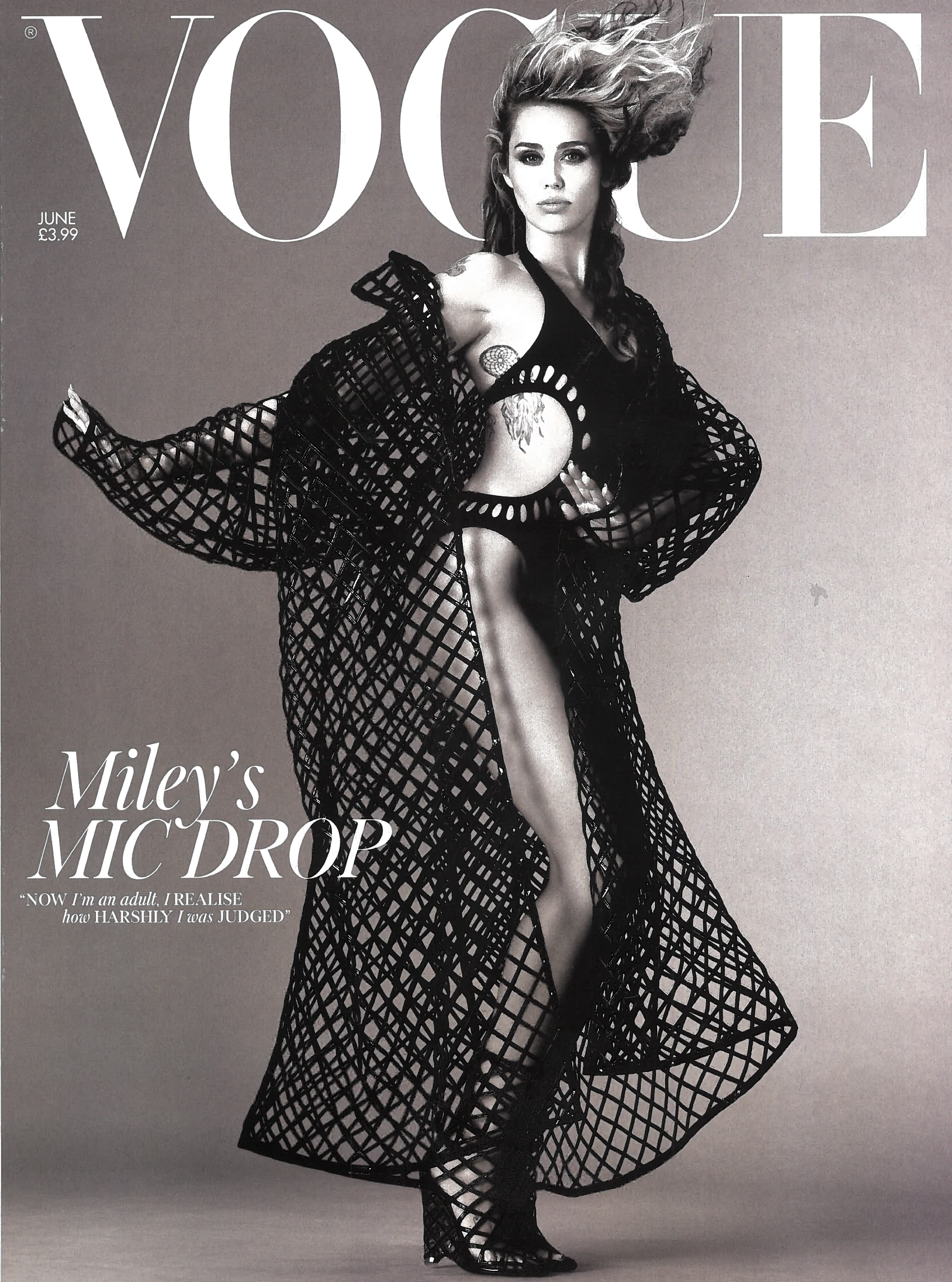 Miley cyrus on the cover of vogue magazine in a black and white photo wearing a black one piece cutout swimsuit