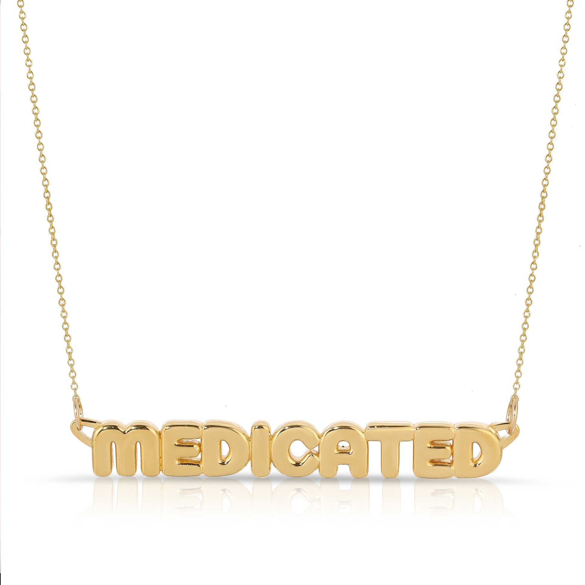 18K solid gold bubble letter necklace that says medicated from the wandering jewel