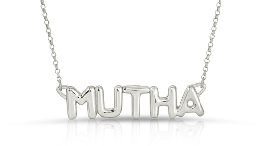 close up pic of 18K solid white gold mother mutha necklace from the wandering jewel