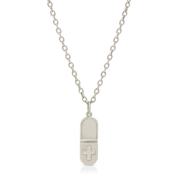 18K solid gold Pill shaped pendant necklace with a cross on the bottom half of the pill from the wandering jewel