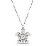 Cute turtle pendant with 7 diamonds on shell and diamond eyes from the wandering jewel
