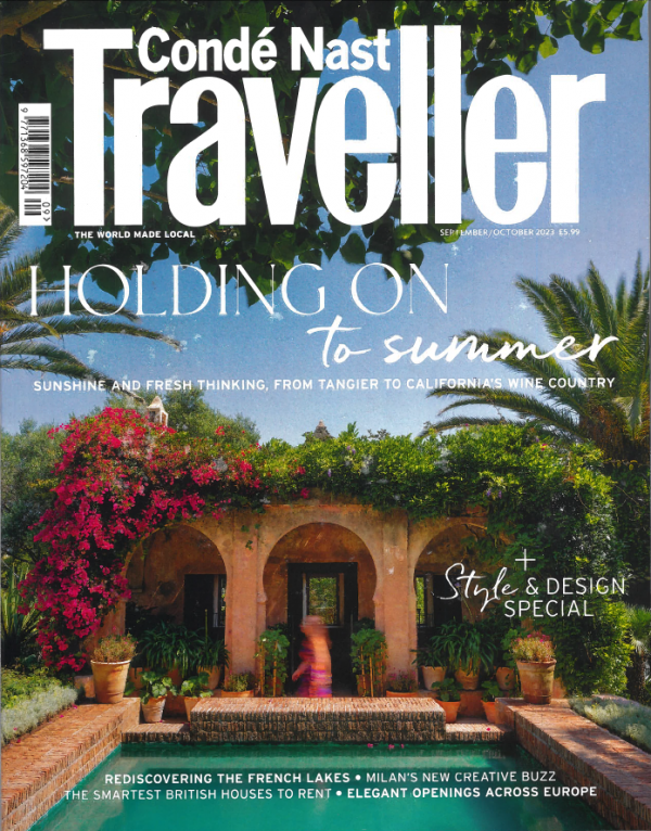 the cover of conde Nast Traveller magazine featuring a private pool Italian villa and jewelry from the wandering jewel