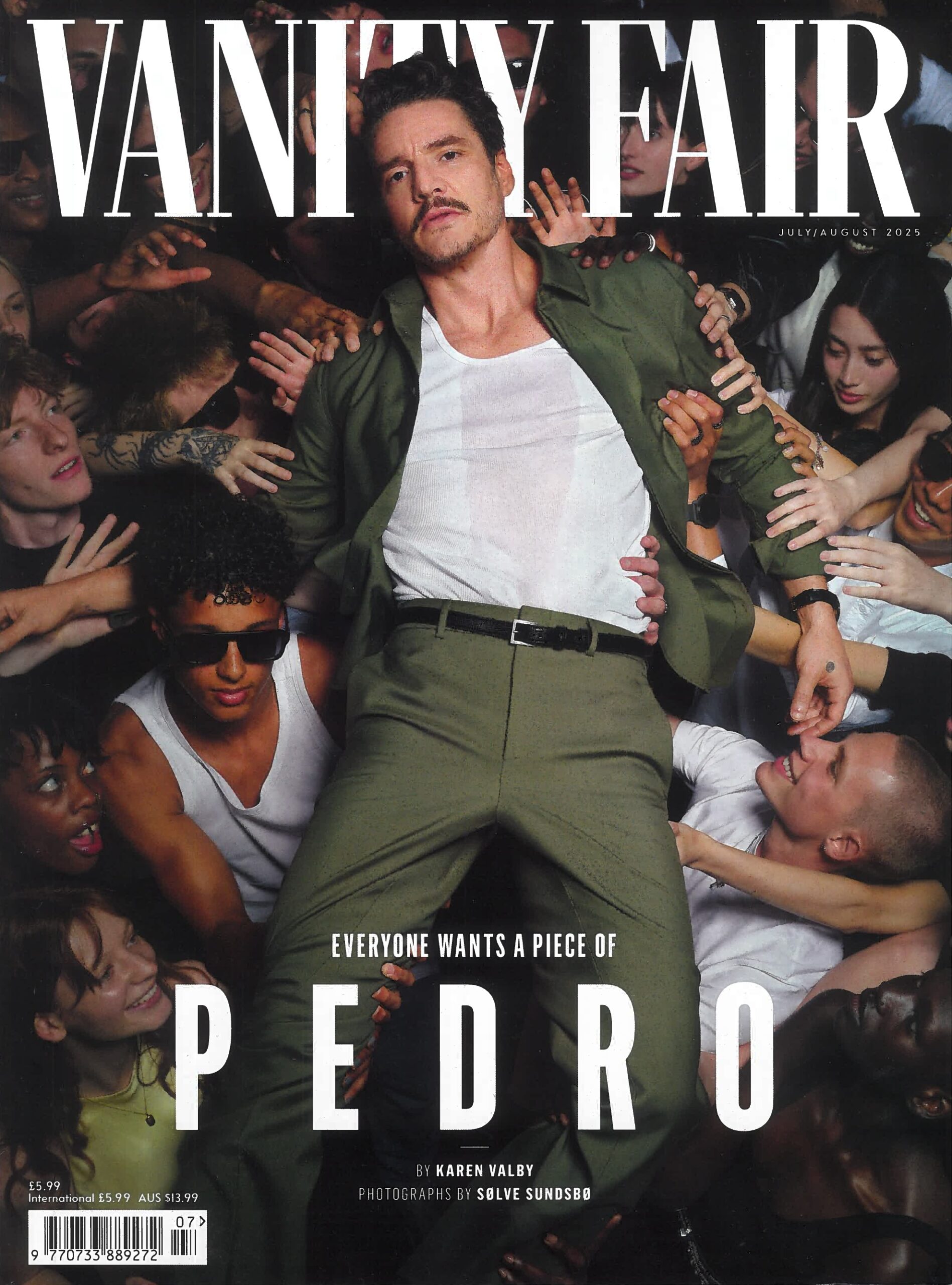 Vanity Fair Magazine Featuring Pedro Pascal being crowd surfed through a bunch of people and jewelry from The Wandering Jewel Jewelry Store