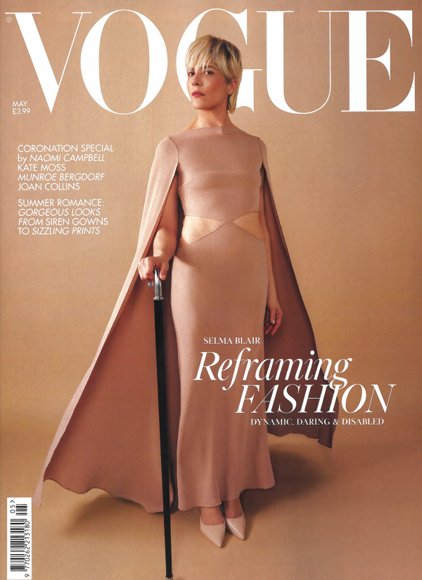 cover of vogue featuring actress Selma Blair in a nude gown with a black cane and also featuring jewelry from the wandering jewel