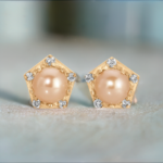 diamond and pearl Pentagon Stud earrings in gold from the wandering jewel