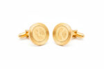 gold telephone receiver cufflinks from the wandering jewel set in front of a white background