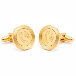 gold telephone receiver cufflinks from the wandering jewel set in front of a white background